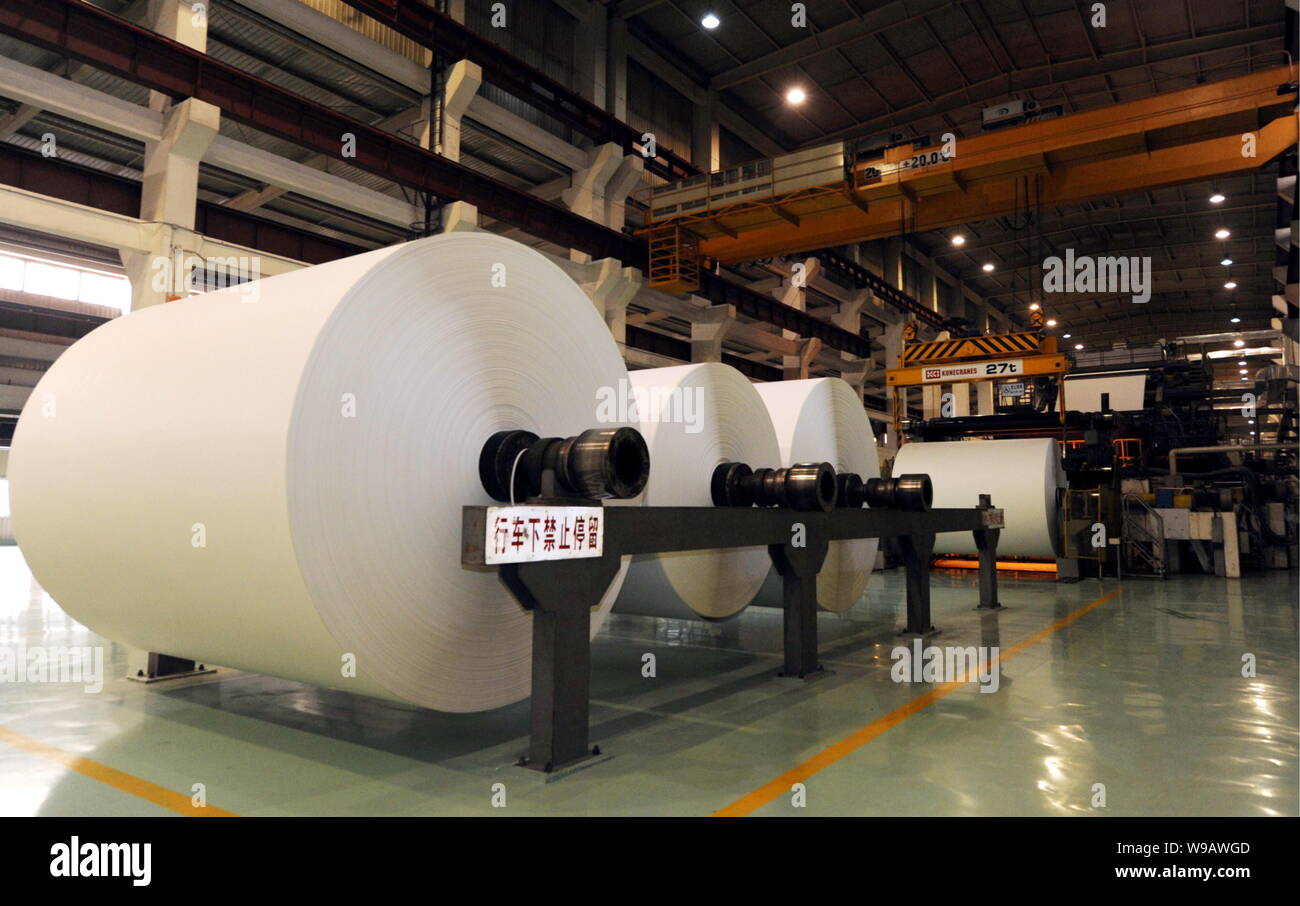 FILE--Paper rolls are seen at the paper factory of Shandong Asia Pacific  Ssymb Pulp and Paper Co., Ltd. in Rizhao city, east Chians Shandong provinc  Stock Photo - Alamy