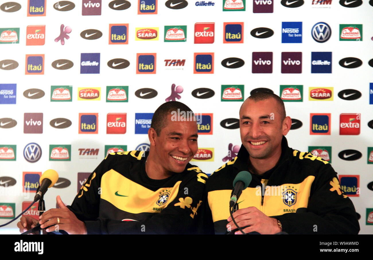 Gilberto Silva (L) and Gomes of Brazil are seen during a press conference in Johannesburg, South Africa, June 9, 2010. Stock Photo