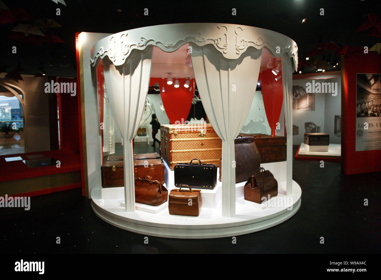 Louis Vuitton antique bags and suitcases are displayed in a