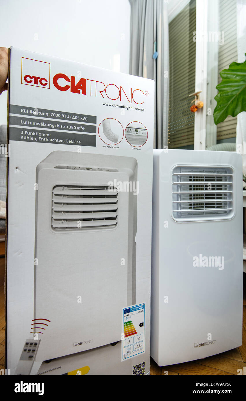 Paris France Jun 23 19 Installing New Portable Air Conditioner Unit Ac During Hot Summer In His Living Room Manufactured By Clatronic Stock Photo Alamy