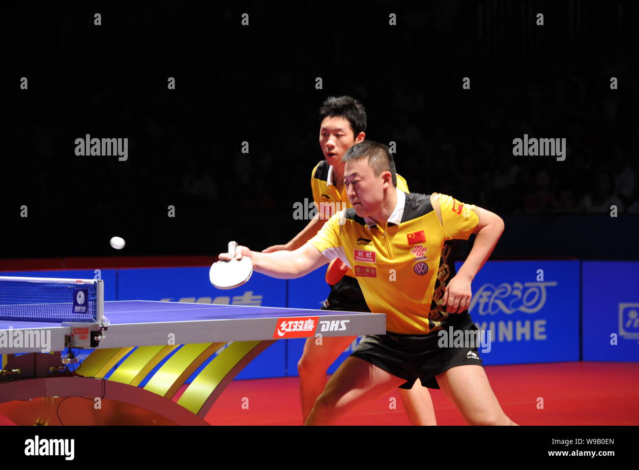 Chinas Ma Lin, front, and Xu Xin compete against their teammates Wang Liqin and Chen Qi in the final of the mens doubles of the 2010 China Open Table Stock Photo