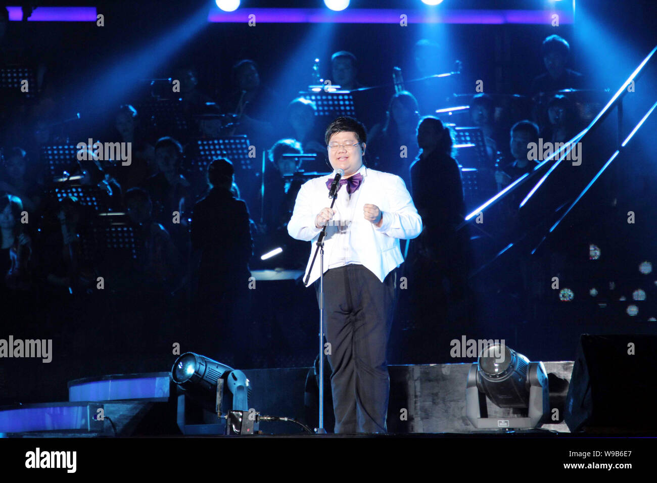 Chinese student singer Zhu Xiaoming, imitator of Mariah Carey, performs