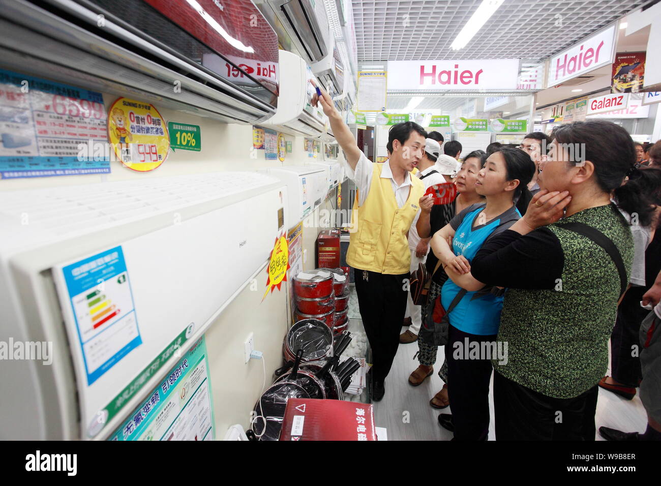 FILE Chinese Customers Shop For Haier Air Conditioners In A Home   File Chinese Customers Shop For Haier Air Conditioners In A Home Appliances Store In Beijing China 22 May 2010 Chinese Home Appliance Giant Ha W9B8ER 