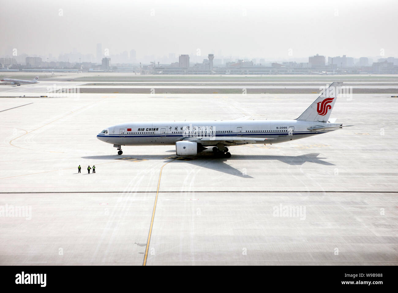 A plane of Air China is seen at Hongqiao International Airport in Shanghai, China, March 16, 2010.   Rolls-Royce Group PLC, the manufacturer of the pl Stock Photo