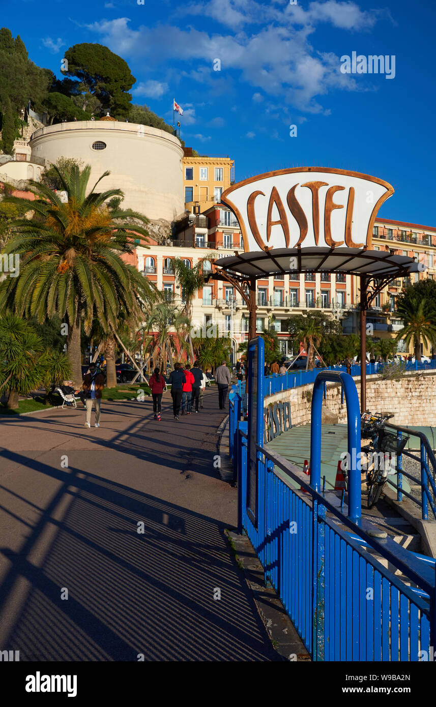 Nice, France - April 04, 2019: Evening view of Nice, Bellanda tower, hotel Suisse and sign of Castel plage restaurant. Stock Photo