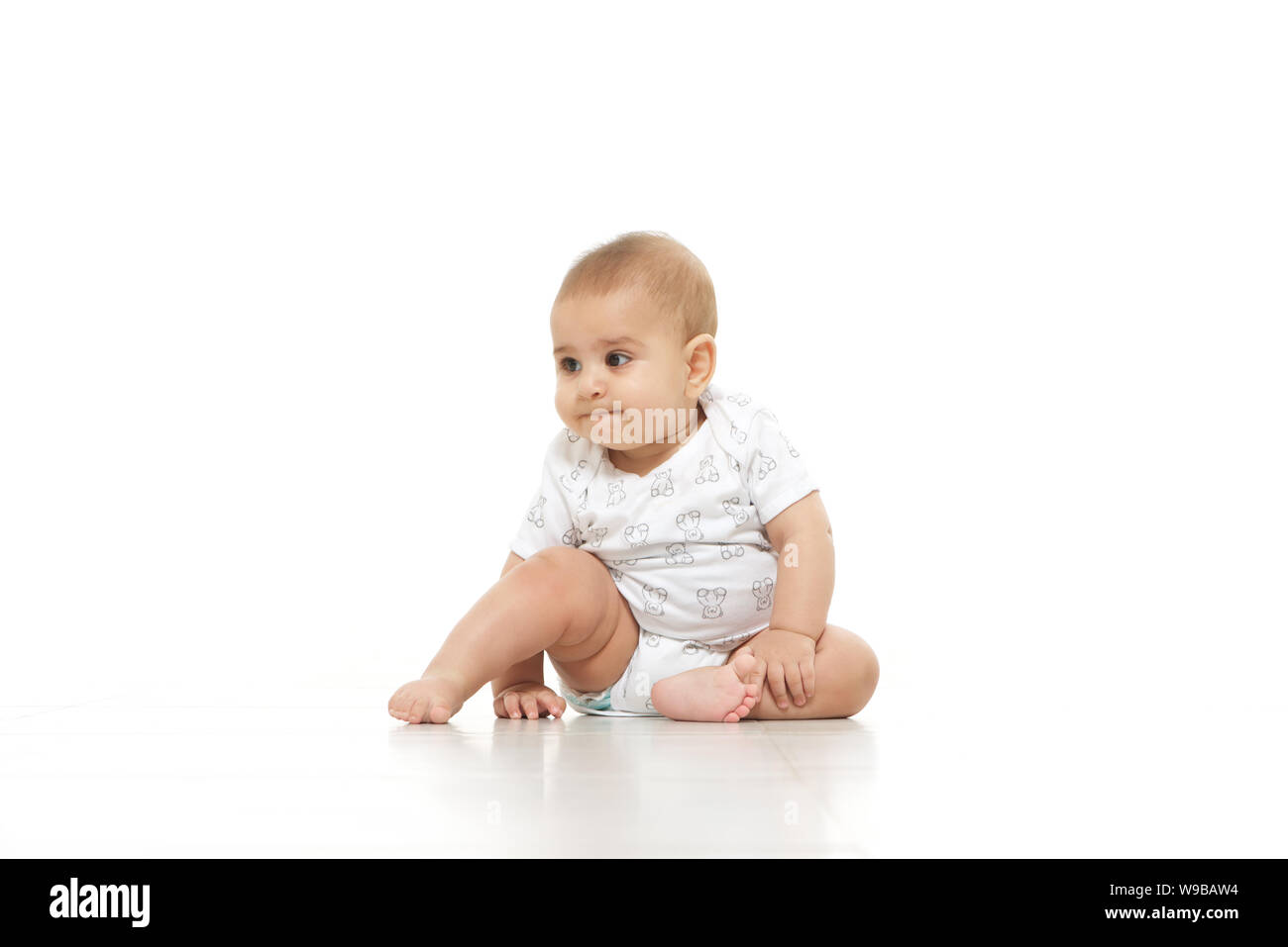 Indian boy sitting floor hi-res stock photography and images - Alamy