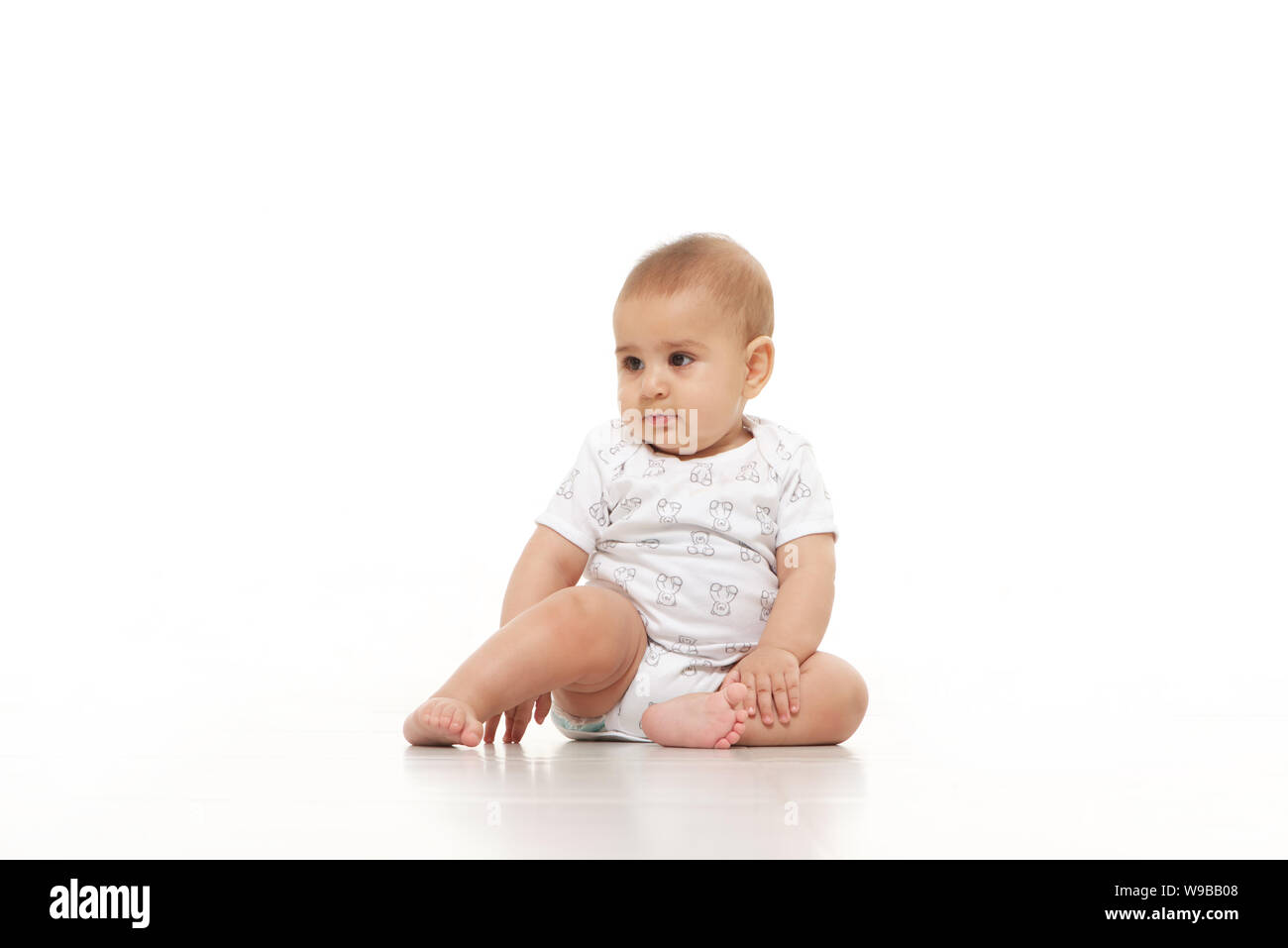 Indian boy sitting floor hi-res stock photography and images - Alamy