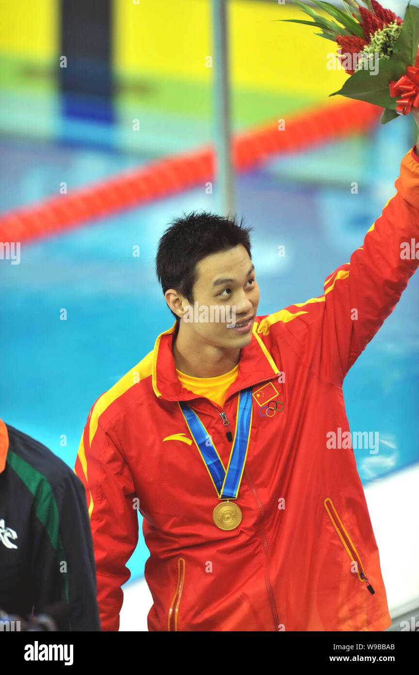 Chinas Zhou Jiawei celebrates his gold medal during the award ceremony ...