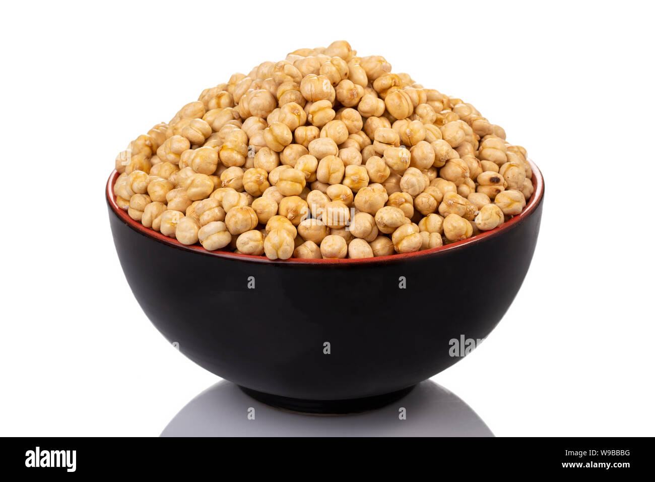 cheakpeas on a black bowl in a white background Stock Photo