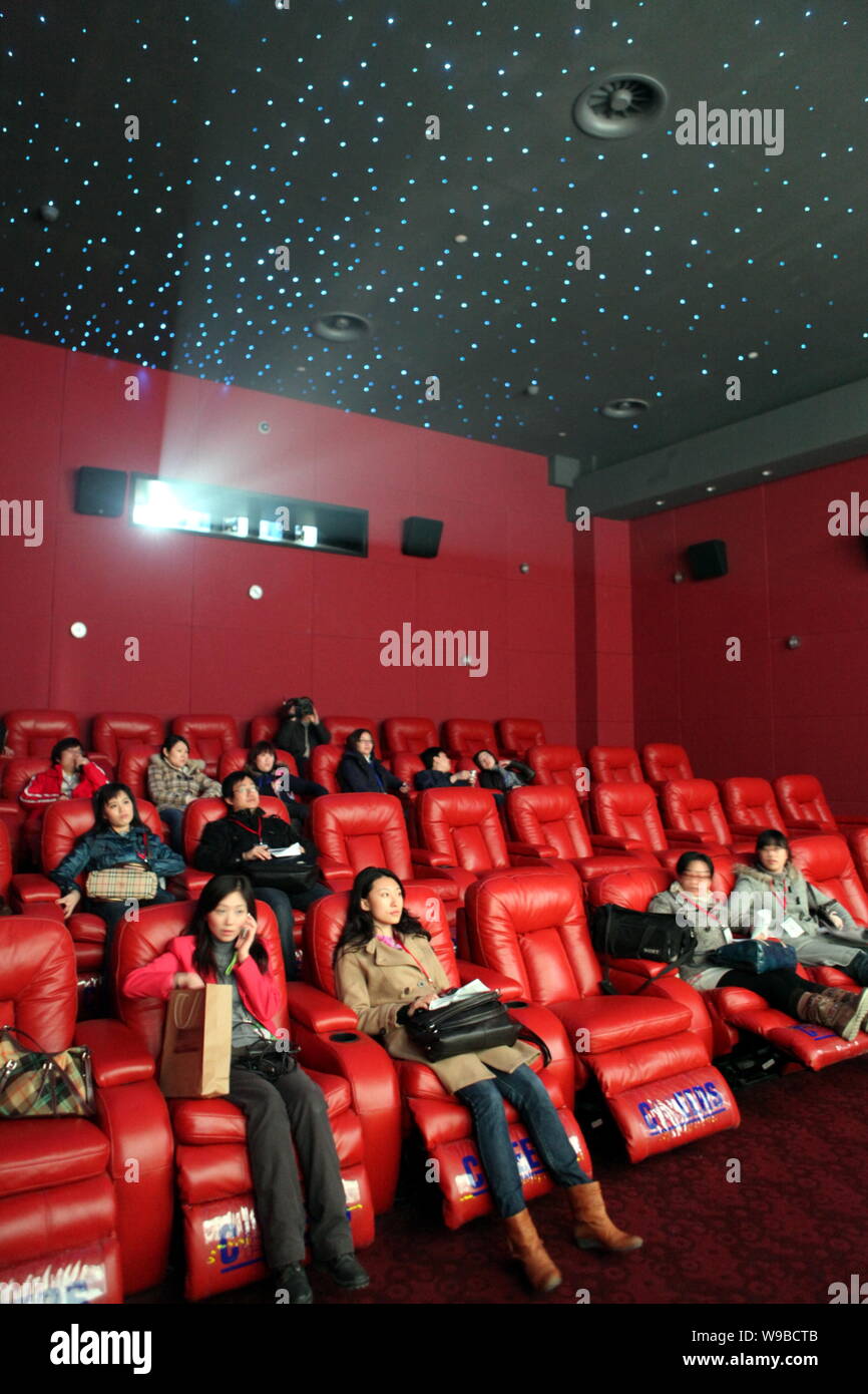 Visitors Watch A Movie In A Screening Hall Of The Expo International Cinema City In The Shanghai Expo Culture Center In The Expo Site In Shanghai Chi Stock Photo Alamy
