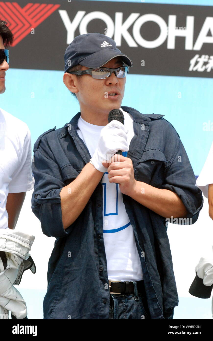 Chinese martial artist Jet Li speaks during the opening ceremony of the One Foundation Celebrity Charity Race at Shanghai International Circuit (SIC) Stock Photo