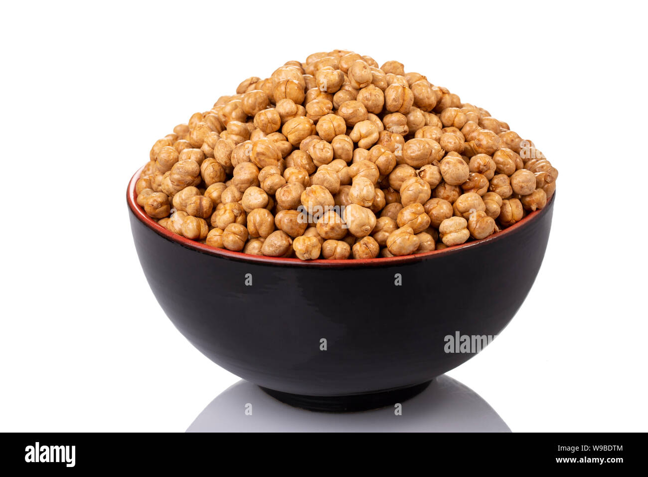 cheakpeas on a black bowl in a white background Stock Photo