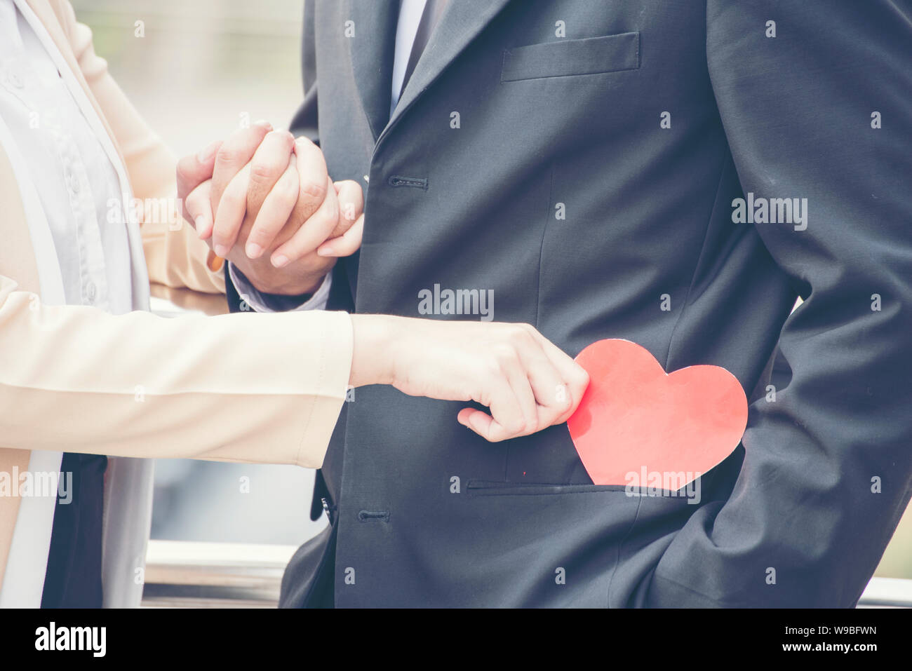 Businesswoman fall in love with CEO. love in the office. Loving concept Stock Photo