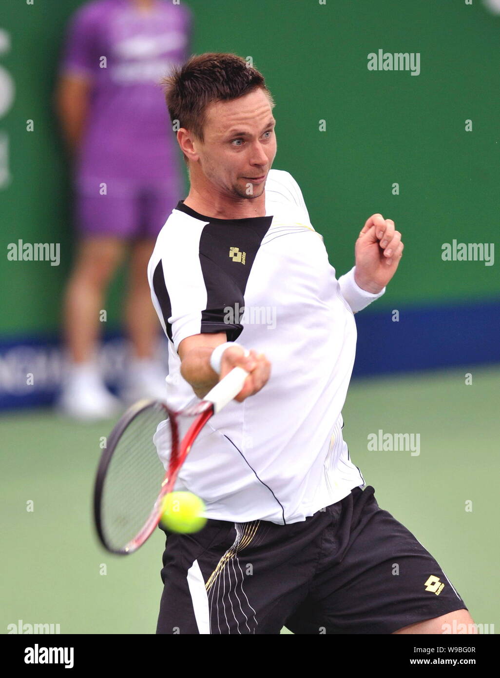 Robin Soderling of Sweden competes against Janko Tipsarevic of Serbia in the second round of mens singles of the 2010 Shanghai Rolex Masters in Shangh Stock Photo