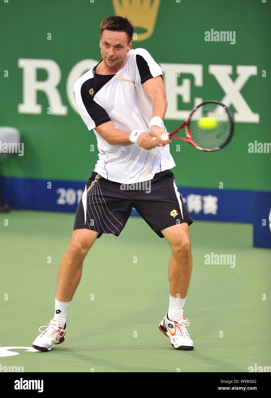 Robin Soderling of Sweden competes against Janko Tipsarevic of Serbia in the second round of mens singles of the 2010 Shanghai Rolex Masters in Shangh Stock Photo