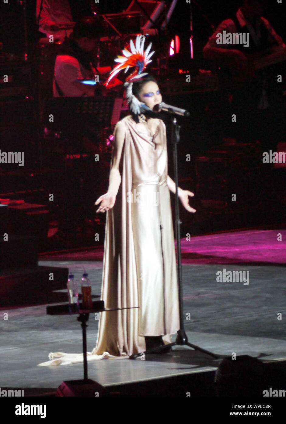 Chinese singer and actress Faye Wong performs at her concert in Shanghai, China, November 27, 2010. Stock Photo