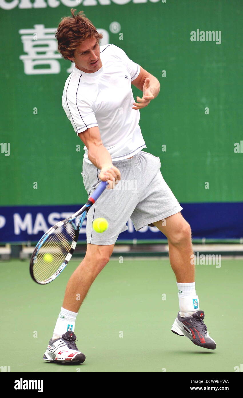 Russian professional tennis player Igor Andreev plays a shot during a  training session for 2010 Shanghai Rolex Masters at Shanghai Qi Zhong Tennis  Cen Stock Photo - Alamy