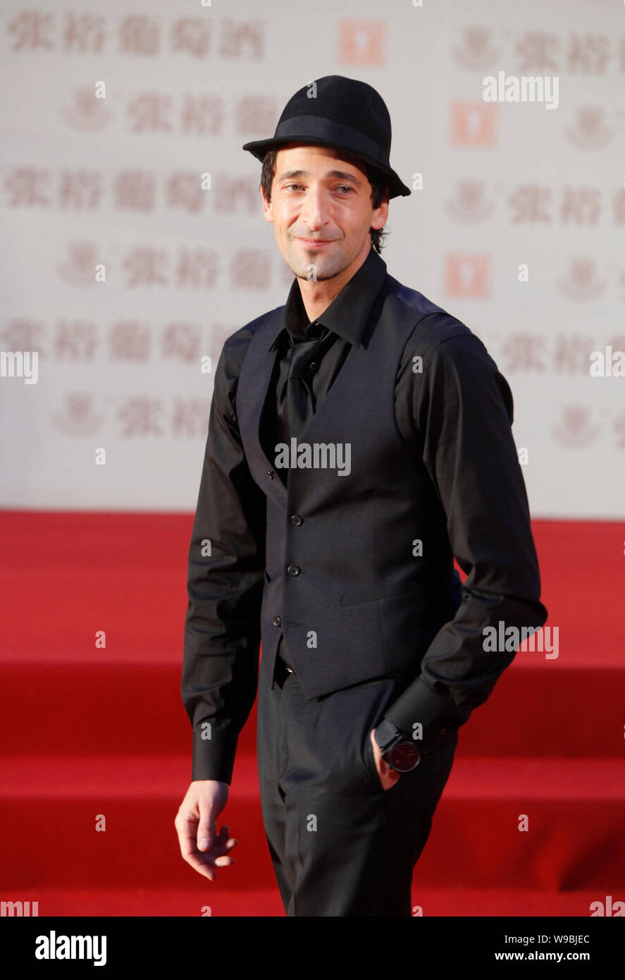 US actor Adrien Brody poses on the red carpet prior to the opening ceremony of the 13th Shanghai International Film Festival in Shanghai, China, June Stock Photo