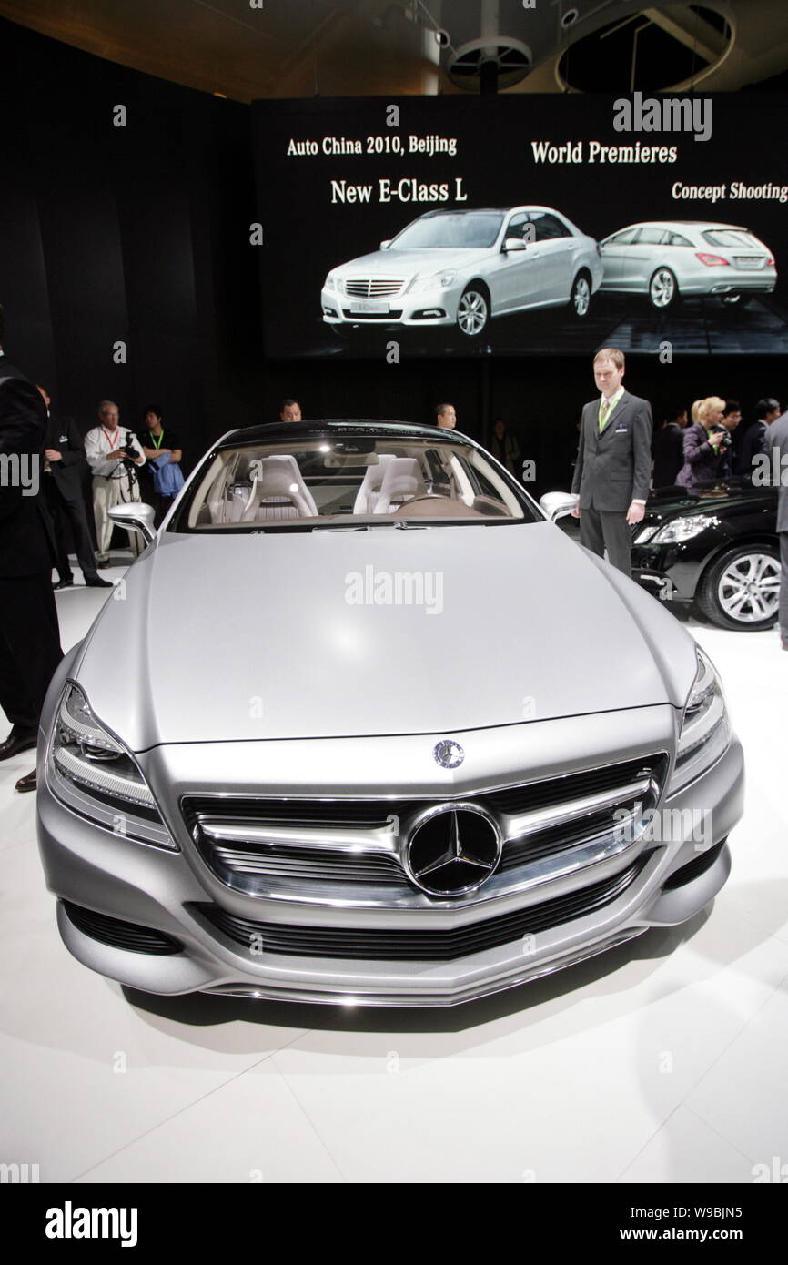 Visitors look at the Mercedes-Benz Shooting Break Concept at the 11th Beijing International Automotive Exhibition, known as Auto China 2010, in Beijin Stock Photo