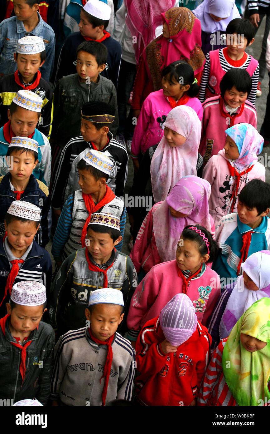 Hui ethnic students are seen on the playground at the Heping Primary School in Linxia, northwest Chinas Gansu province, June 30, 2010.   Heping Primar Stock Photo
