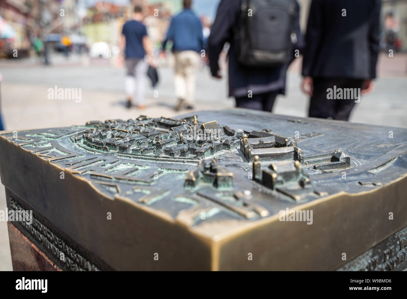 Warsaw, Poland - August 2019: Scaled tactile map of Warsaw Old Town for visually impaired people. Blurred background. Stock Photo