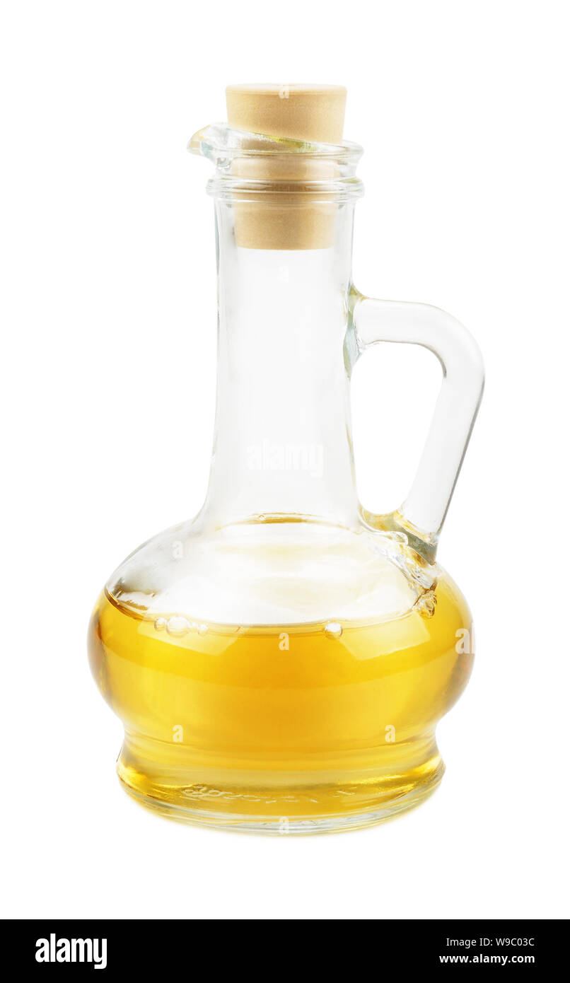 Glass carafe with vegetable oil isolated on white background Stock Photo