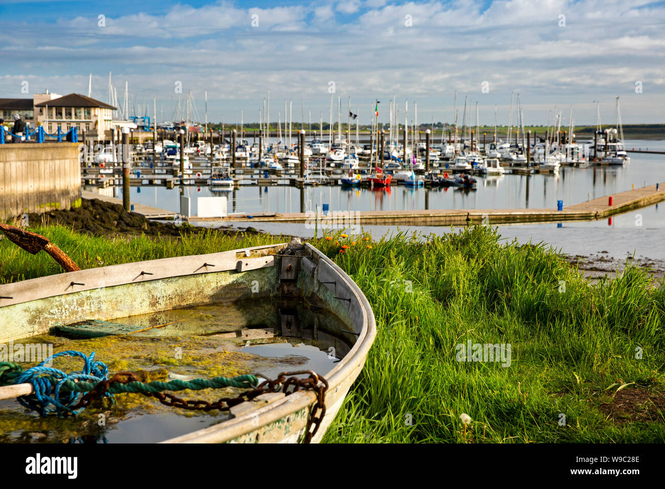 Ireland, Leinster, Fingal, Co Dublin, Malahide, water filled rowing boat above the Marina Stock Photo