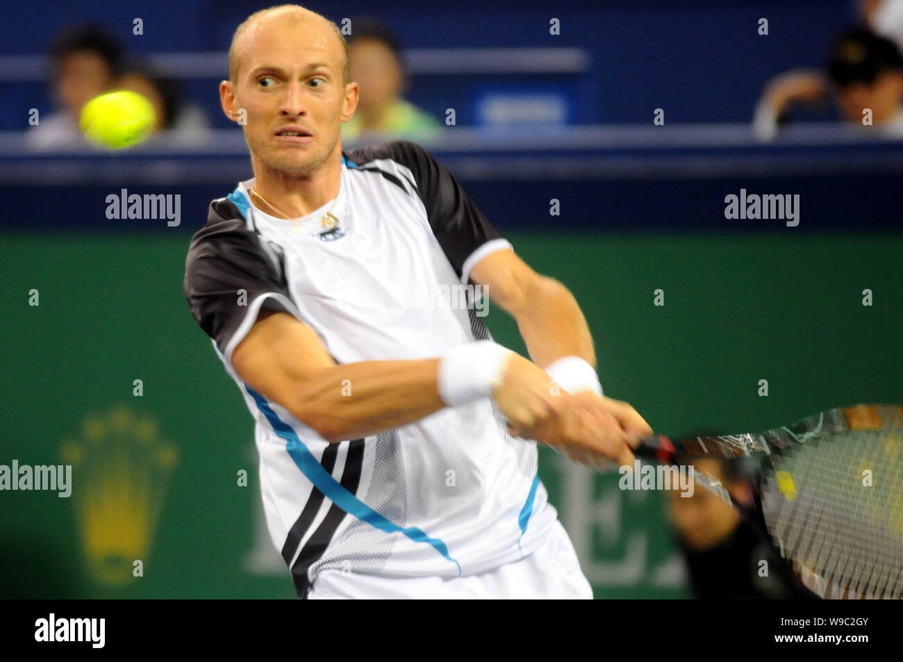 Nikolay Davidenko of Russia returns a shot against Rafael Nadal of Spain in  the final of the 2009 Shanghai ATP Masters 1000 tennis tournament in Shang  Stock Photo - Alamy
