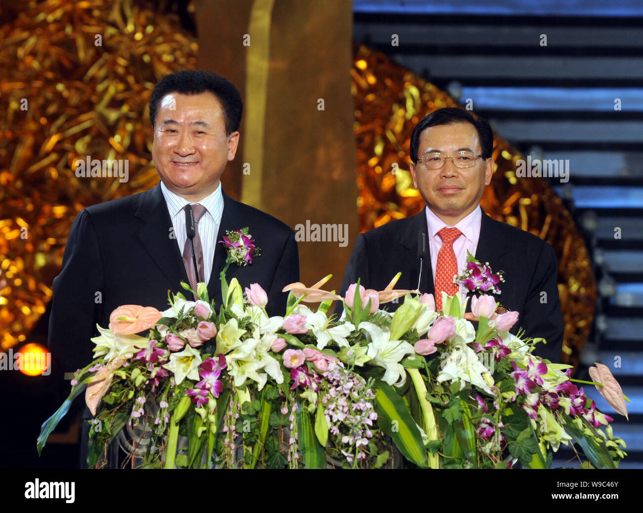 Wang Jianlin, left, Chairman and President of Dalian Wanda Group, and Li Dongsheng, Chairman and President of TCL Corporation, are seen at the 2009 CC Stock Photo