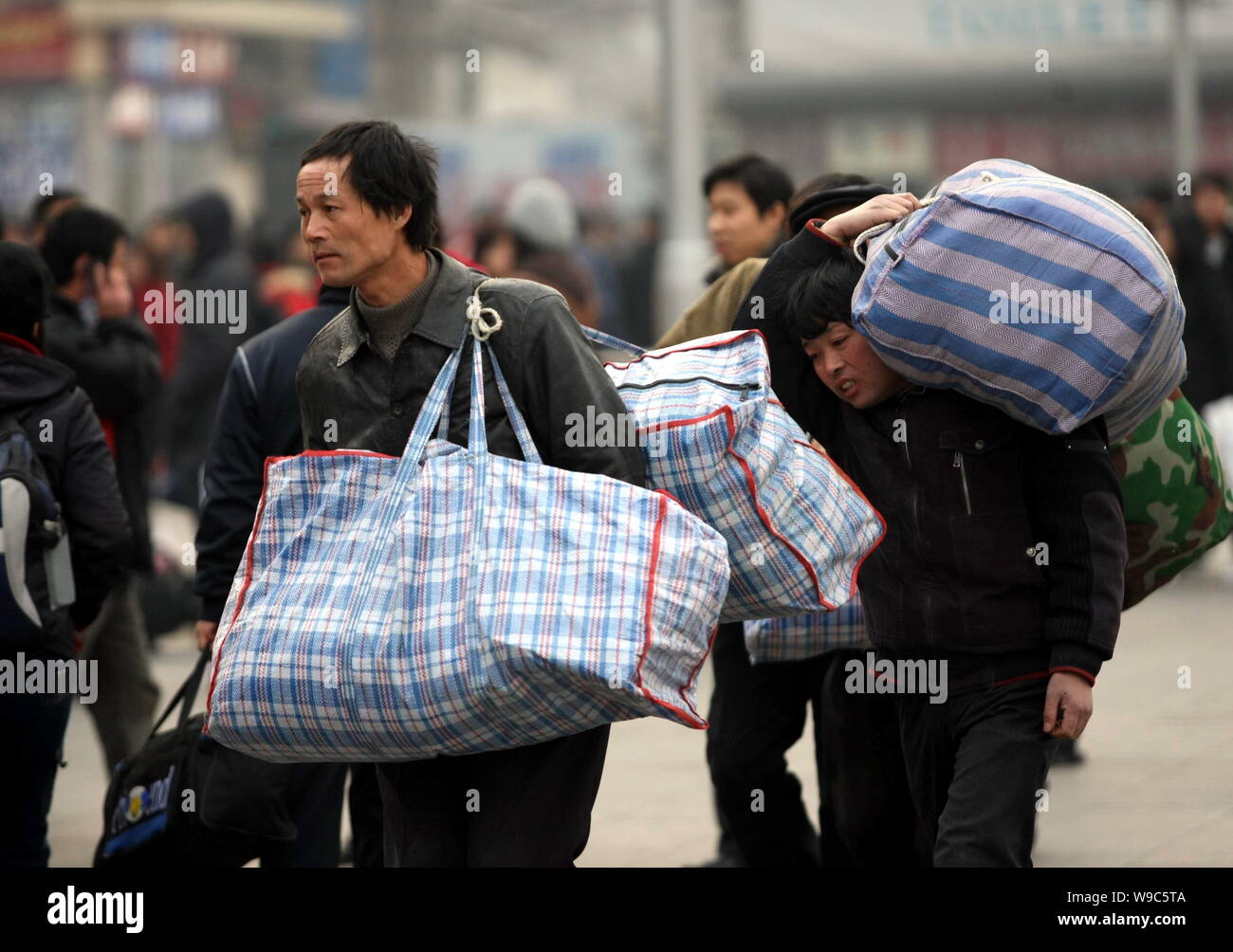 Migrant workers beijing railway station hi-res stock photography