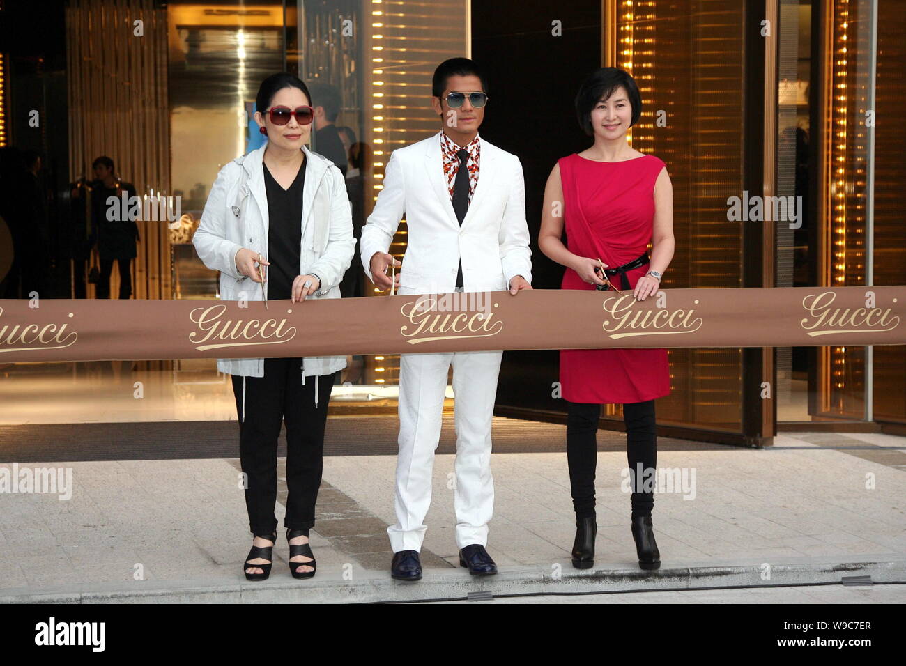 From left) Mimi Tang, President of Asia Pacific region of Gucci Group, Hong  Kong singer and actor Aaron Kwok and Pansy Ho (Ho Chiu-king), Managing di  Stock Photo - Alamy