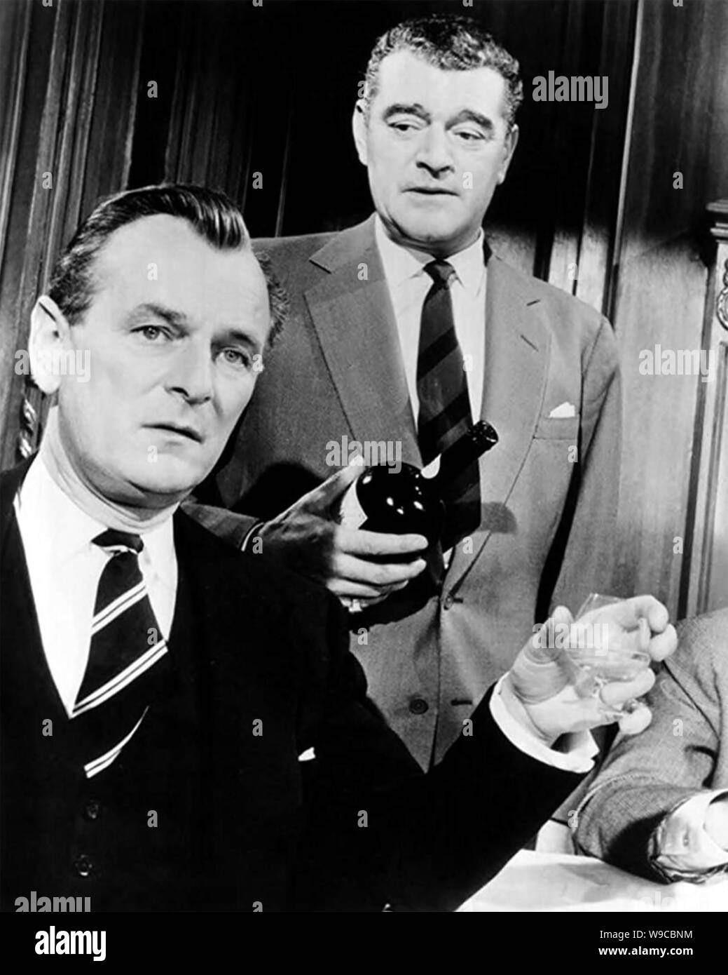 THE LEAGUE OF GENTLEMEN 1960 British Lion film with Jack Hawkins at right and Nigel Patrick Stock Photo
