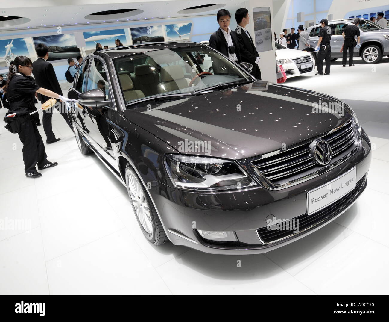 Visitors look at a Passat New Lingyu manufactured by Shanghai