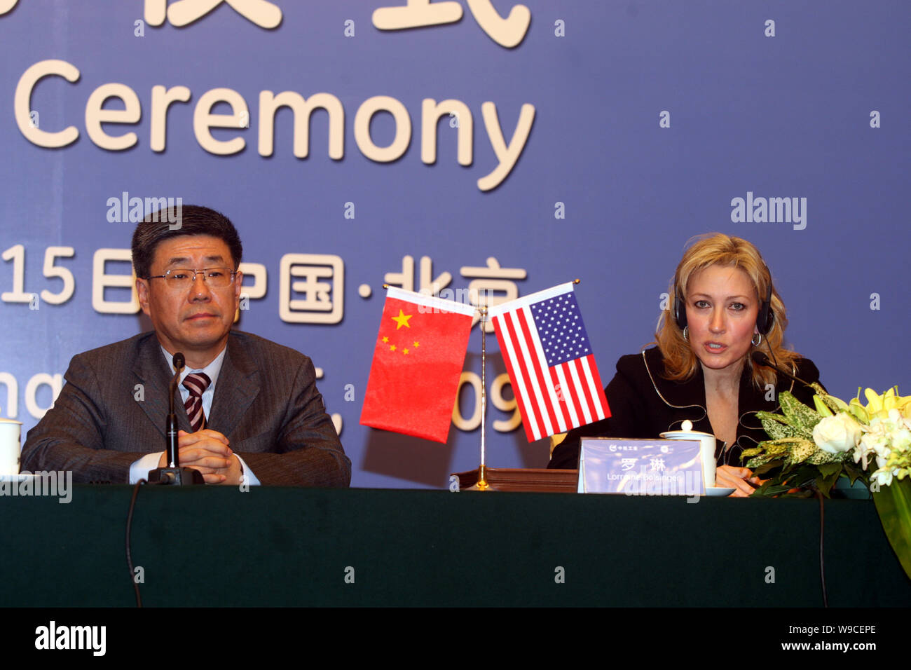 Lorraine Bolsinger, head of GE Aviation Systems, and an unnamed Chinese official, are seen during the signing ceremony of a framework for the Avionics Stock Photo