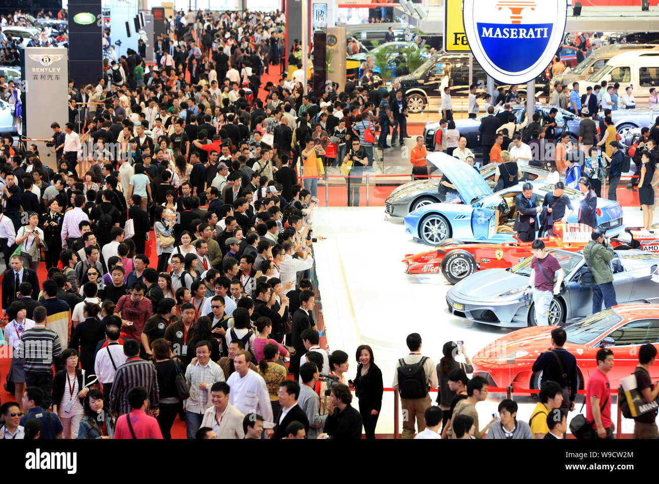 Crowds of visitors are seen at the stand of Ferrari and Mesarati during the 13th Shanghai International Automobile Industry Exhibition, known as Auto Stock Photo