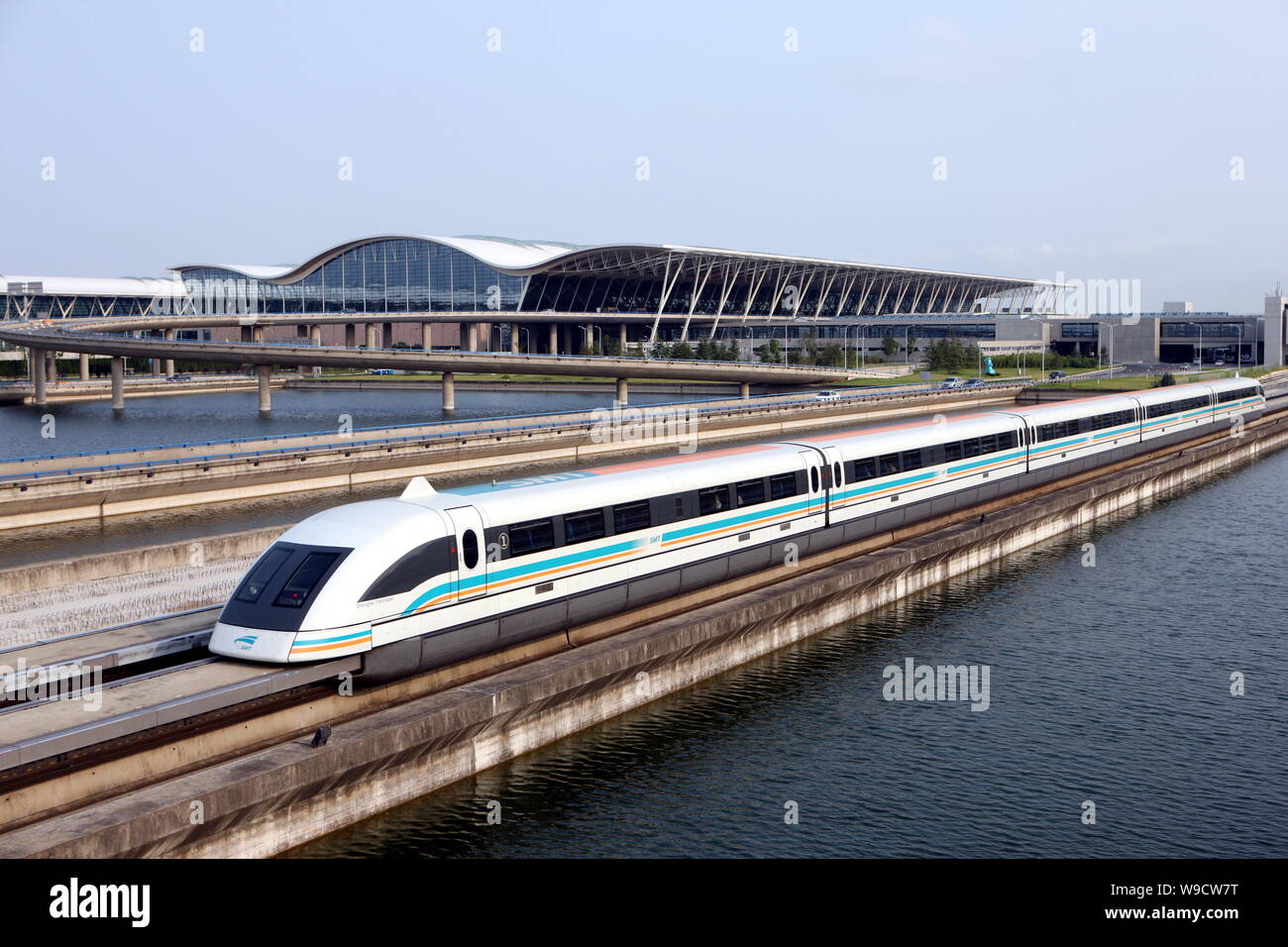 --FILE--A maglev train drives past the Shanghai Pudong International ...