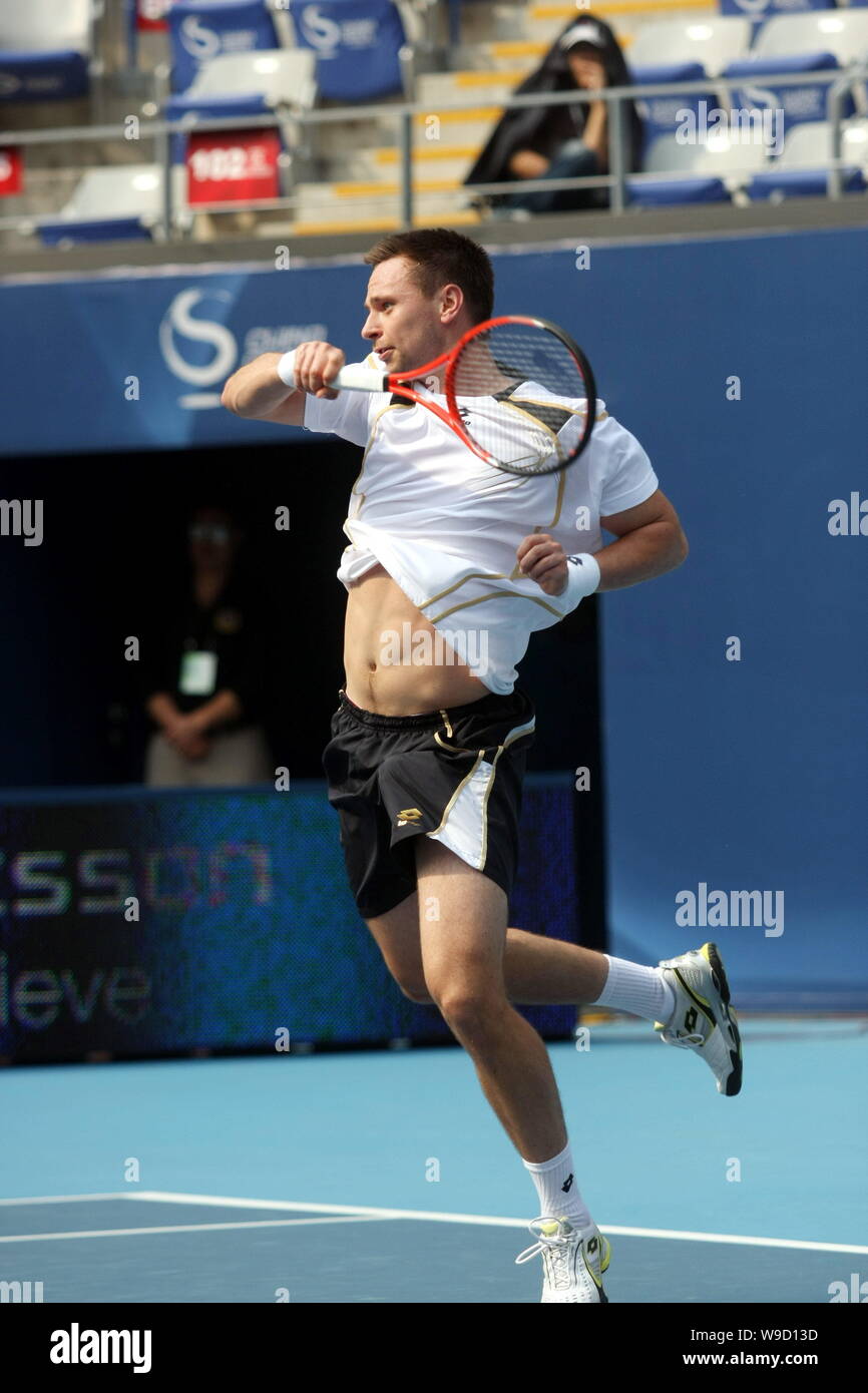 Robin Soderling of Sweden competes against Novak Djokovic of Serbia during the semifinal of the mens singles of the China Open 2009 in Beijing, China, Stock Photo