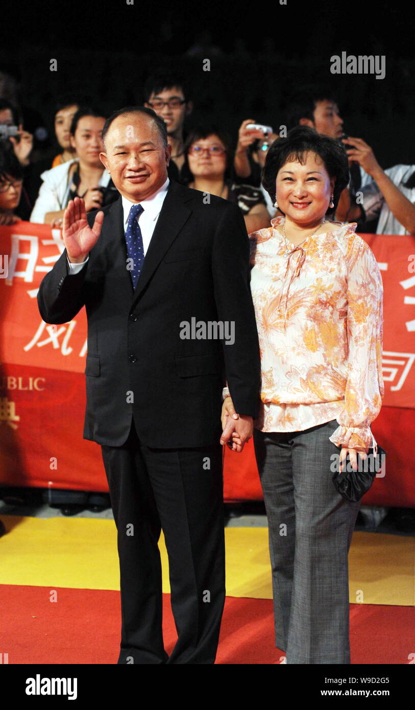 Hollywood film director John Woo, left, and his wife Annie Woo Ngau