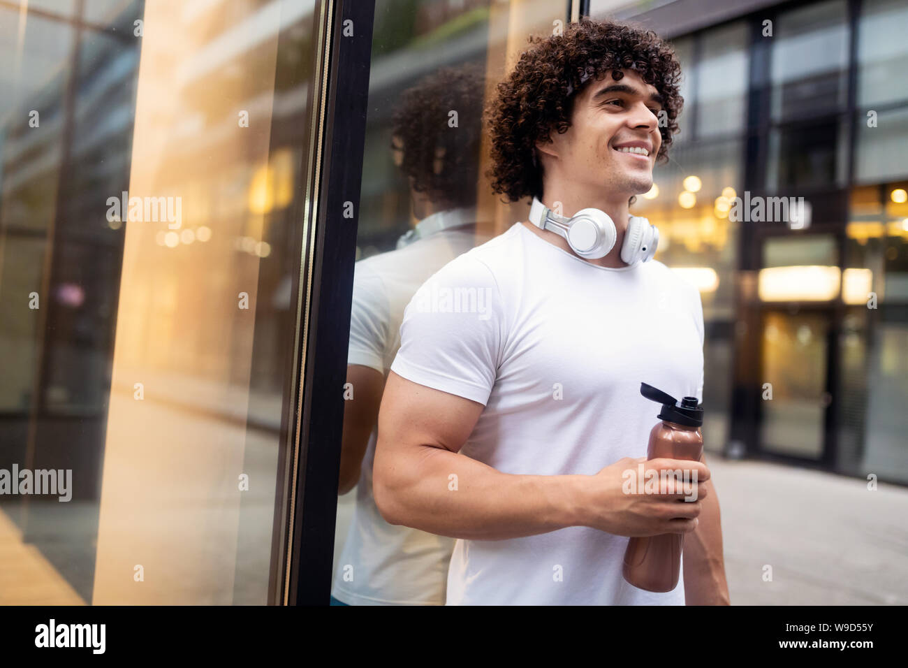 Handsome muscular fit young man hi-res stock photography and images - Alamy