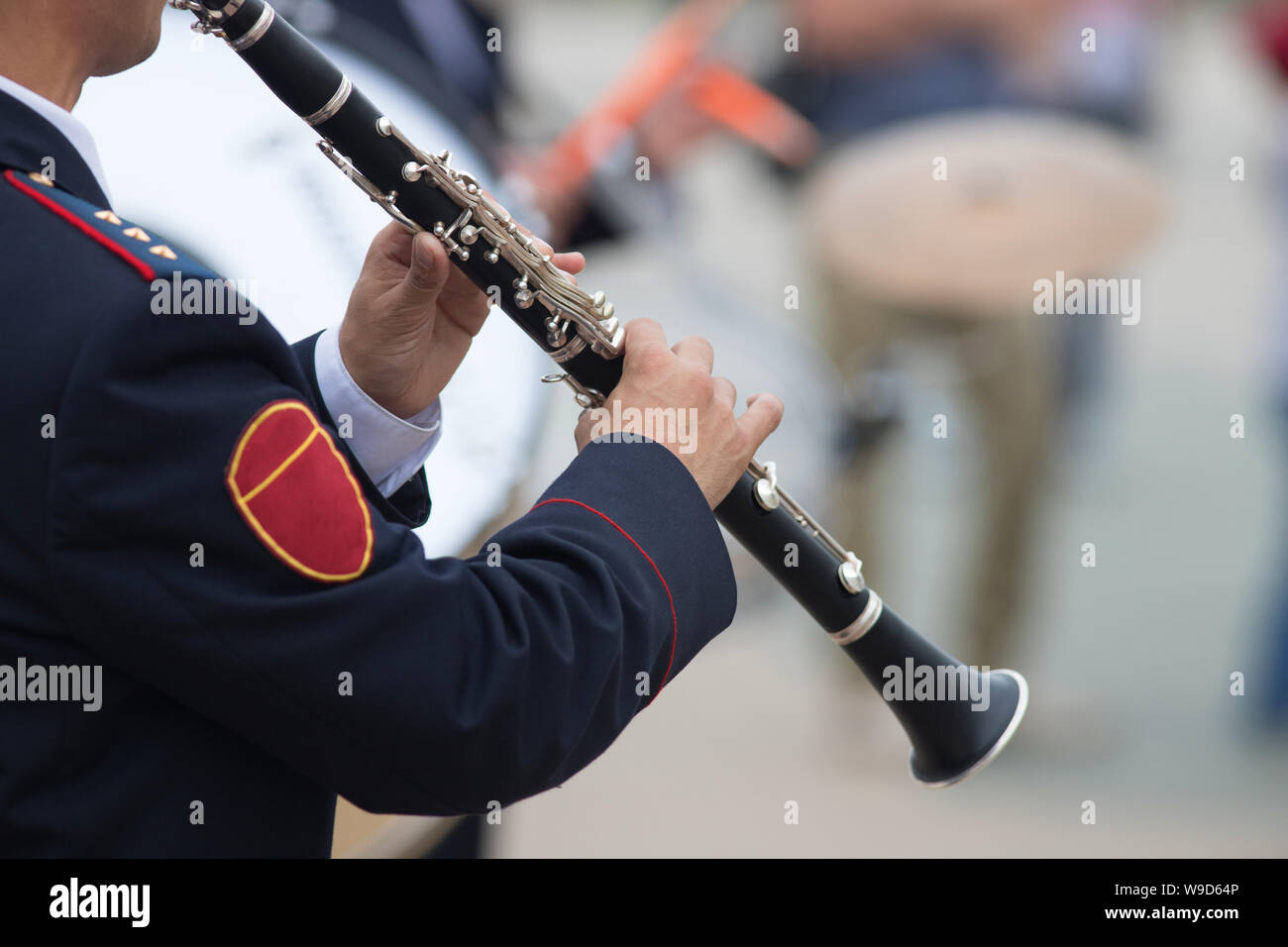 A wind instrument parade a man playing Stock Photo Alamy