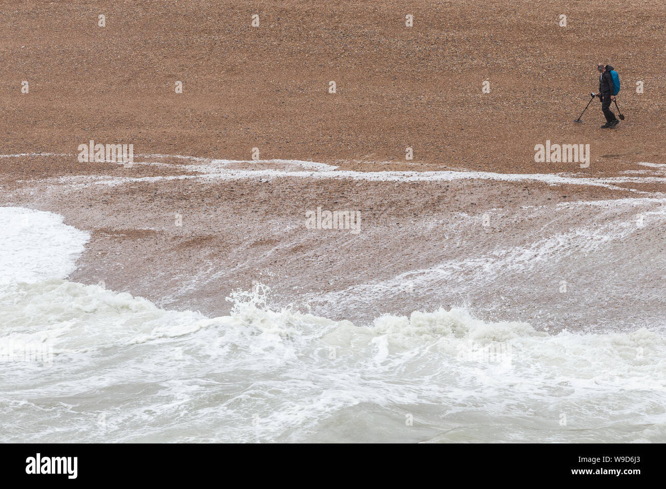 metal detector man on brighton beach Stock Photo Alamy