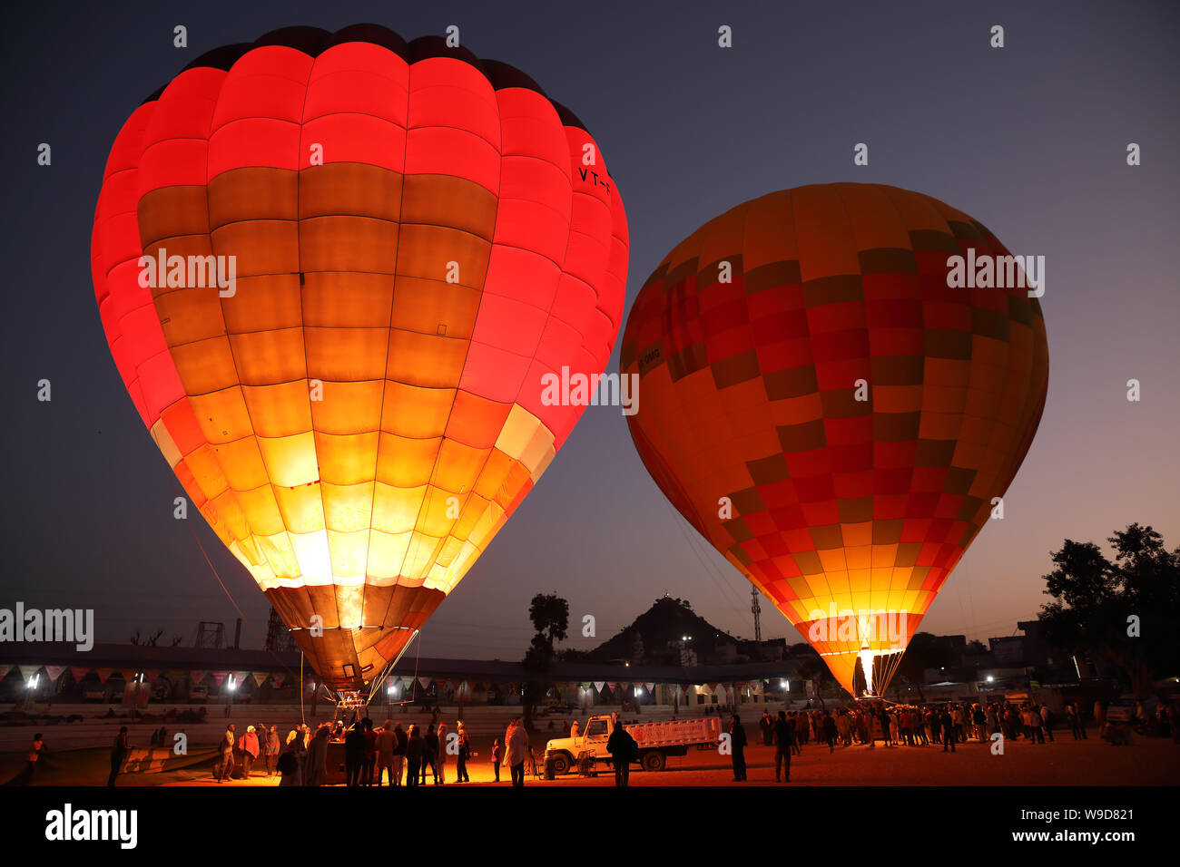 Hot air balloons at the Mela Ground of the Camel Fair in Pushkar, Rajasthan India. The fair is the largest camel fair in India. Stock Photo