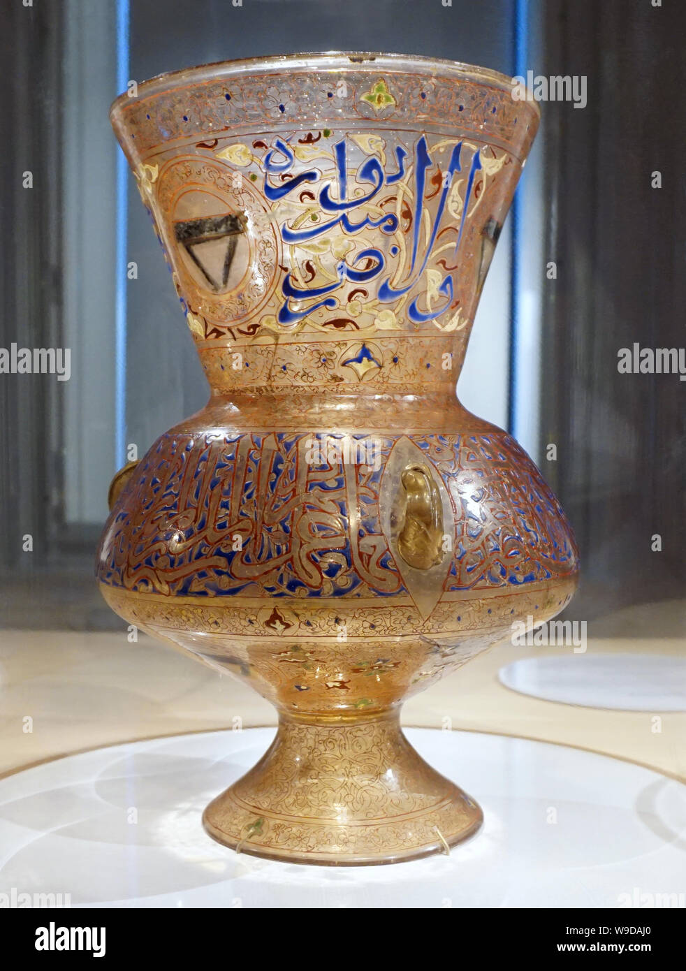 Mosque lamp from Egypt or Syria 1322-1328 AD.It bears the name of the person who commissioned it;the emir Sunqur al-Saadi,inspector of the Mamluk army Stock Photo