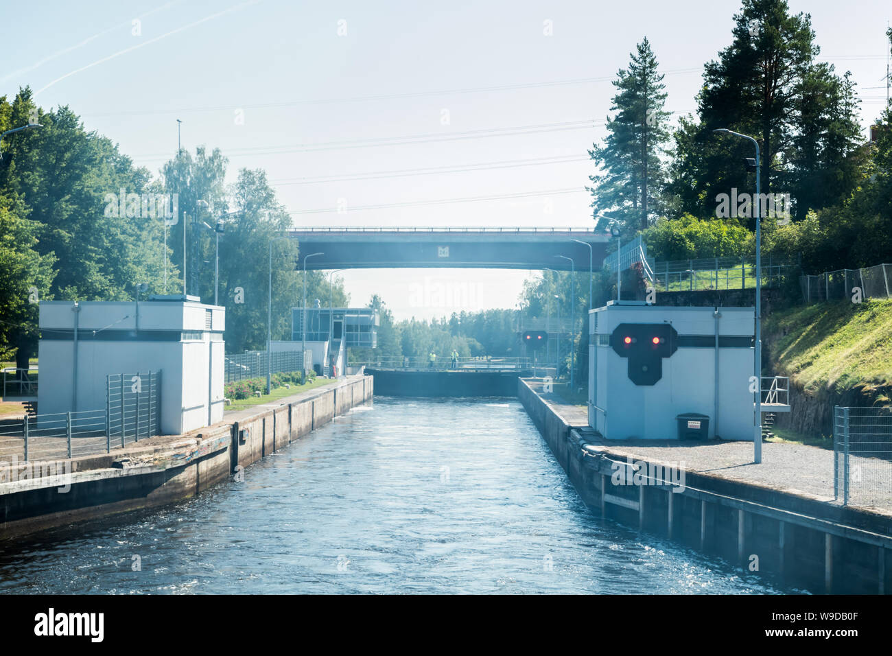 Lappeenranta, Finland - August 7, 2019: Lock and bridge on the Saimaa Canal at Malkia. Engineers are finding out the reason for the failure of the gat Stock Photo