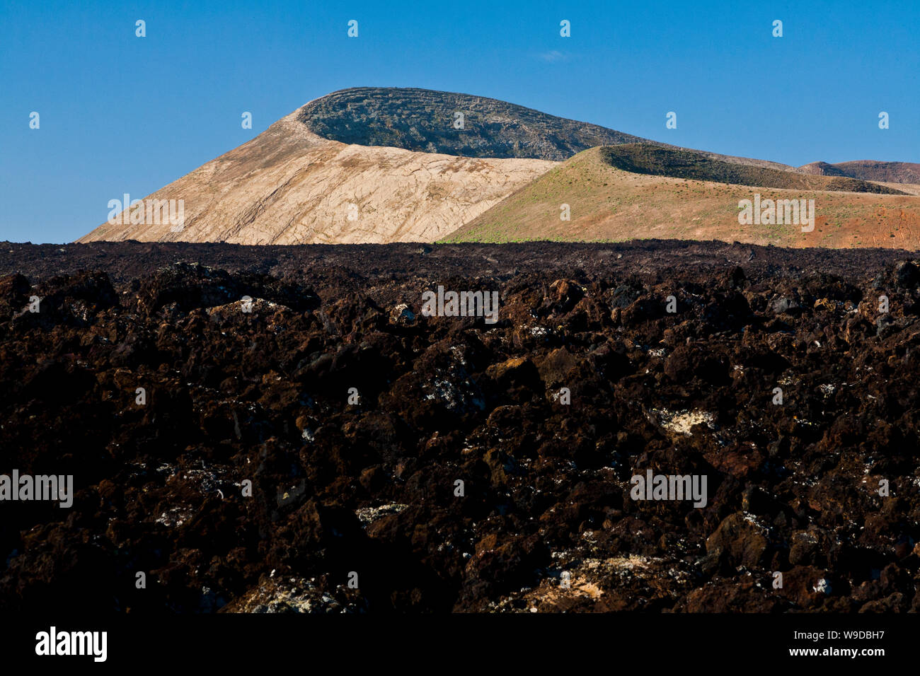 Montaña Blanca and Montaña Caldereta amongst the lavaflows in Lanzarote, Canary Islands, Spain Stock Photo