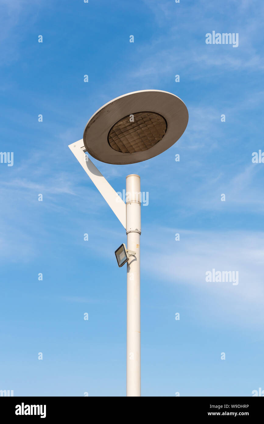 LED lighting pole new technoly of lighting system with blue sky on outdoor street walkway. Stock Photo