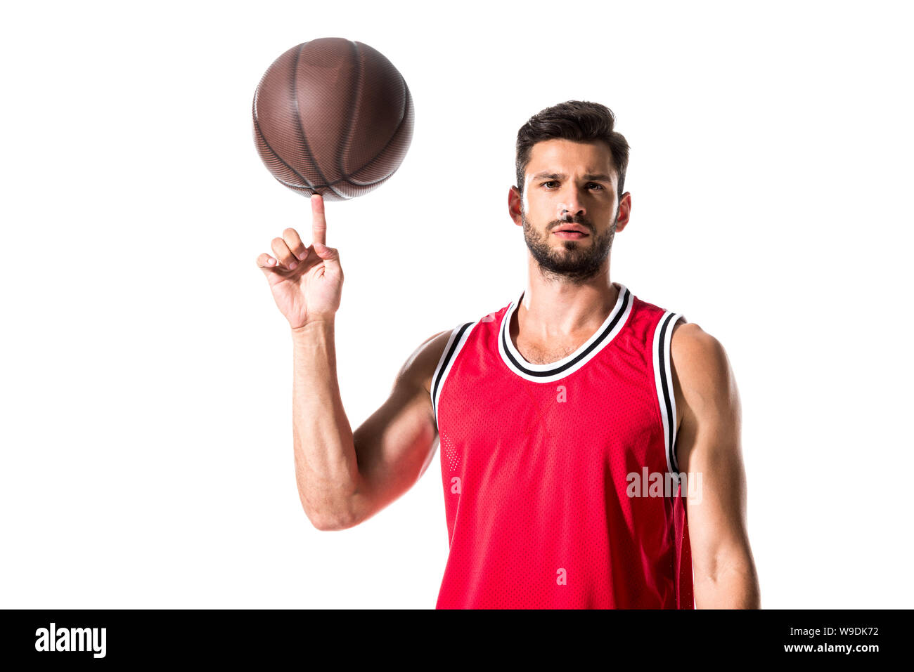 basketball player spinning on finger ball and looking at camera Isolated On  White Stock Photo - Alamy