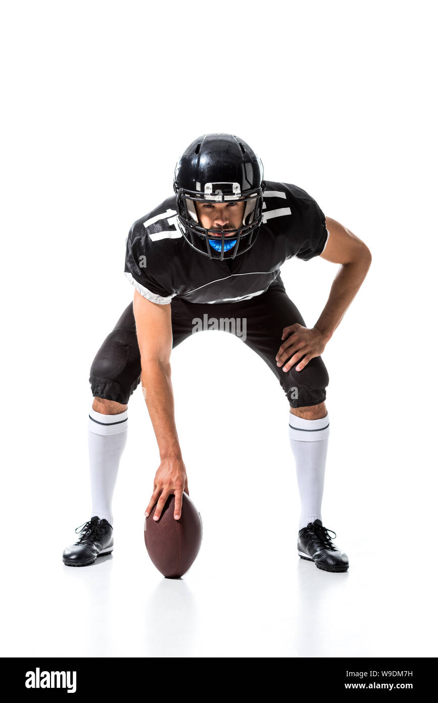American Football player in helmet with ball Isolated On White Stock