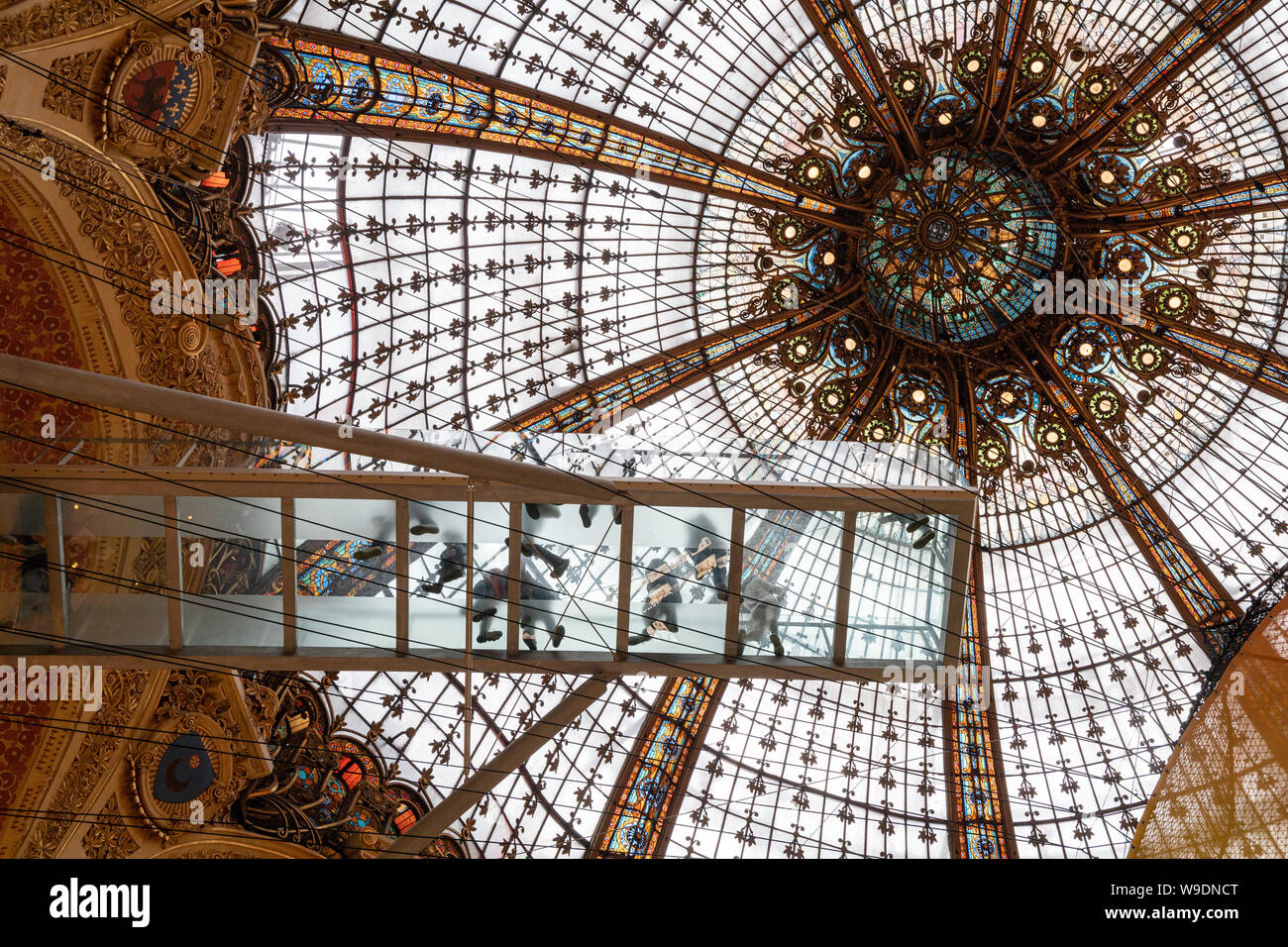 View from below the art nouveau domed ceiling and 9 metre Glasswalk of the Galeries Lafayette department store in Paris Stock Photo