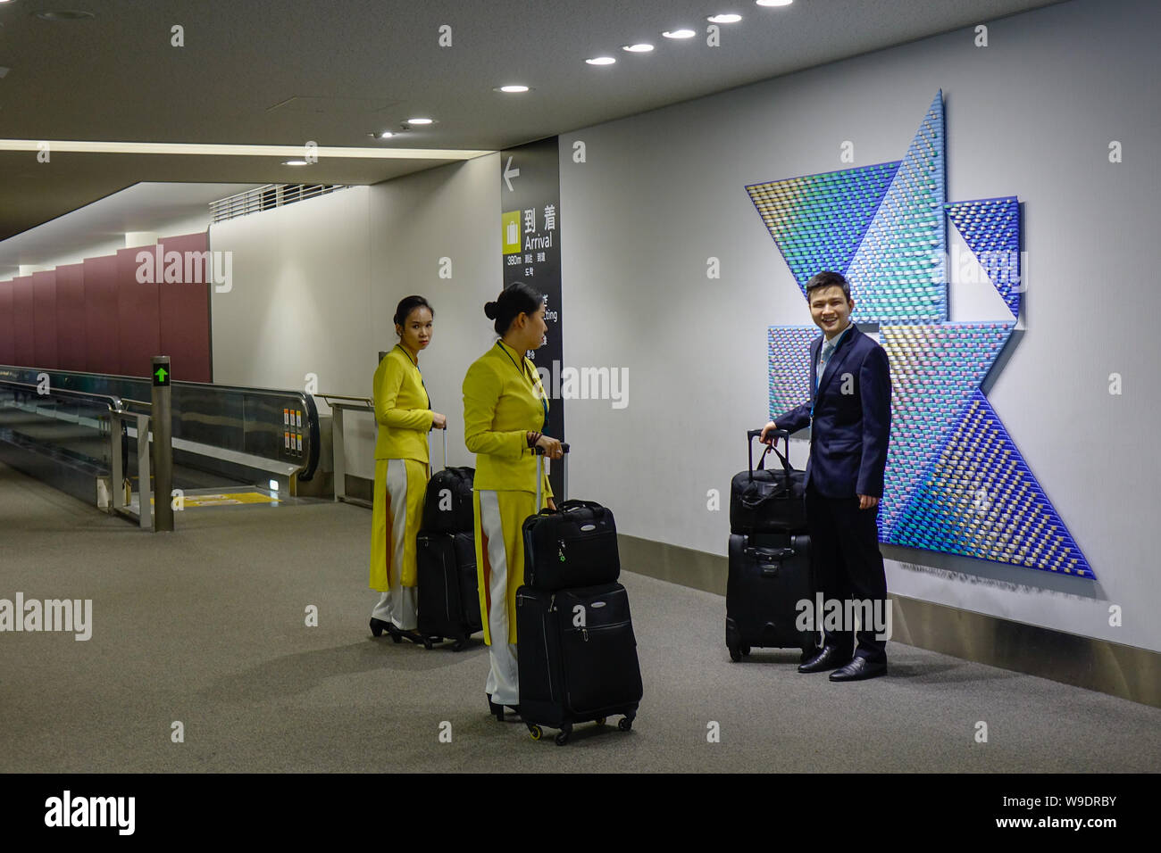 Nagoya, Japan - Mar 16, 2018. Vietnam Airlines crew members walking at Nagoya Chubu Centrair Airport (NGO). Stock Photo